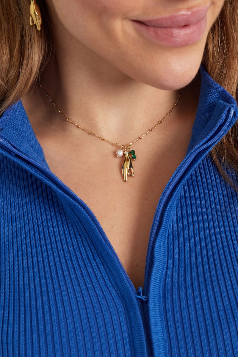 Ketting met open hand bedel - paars