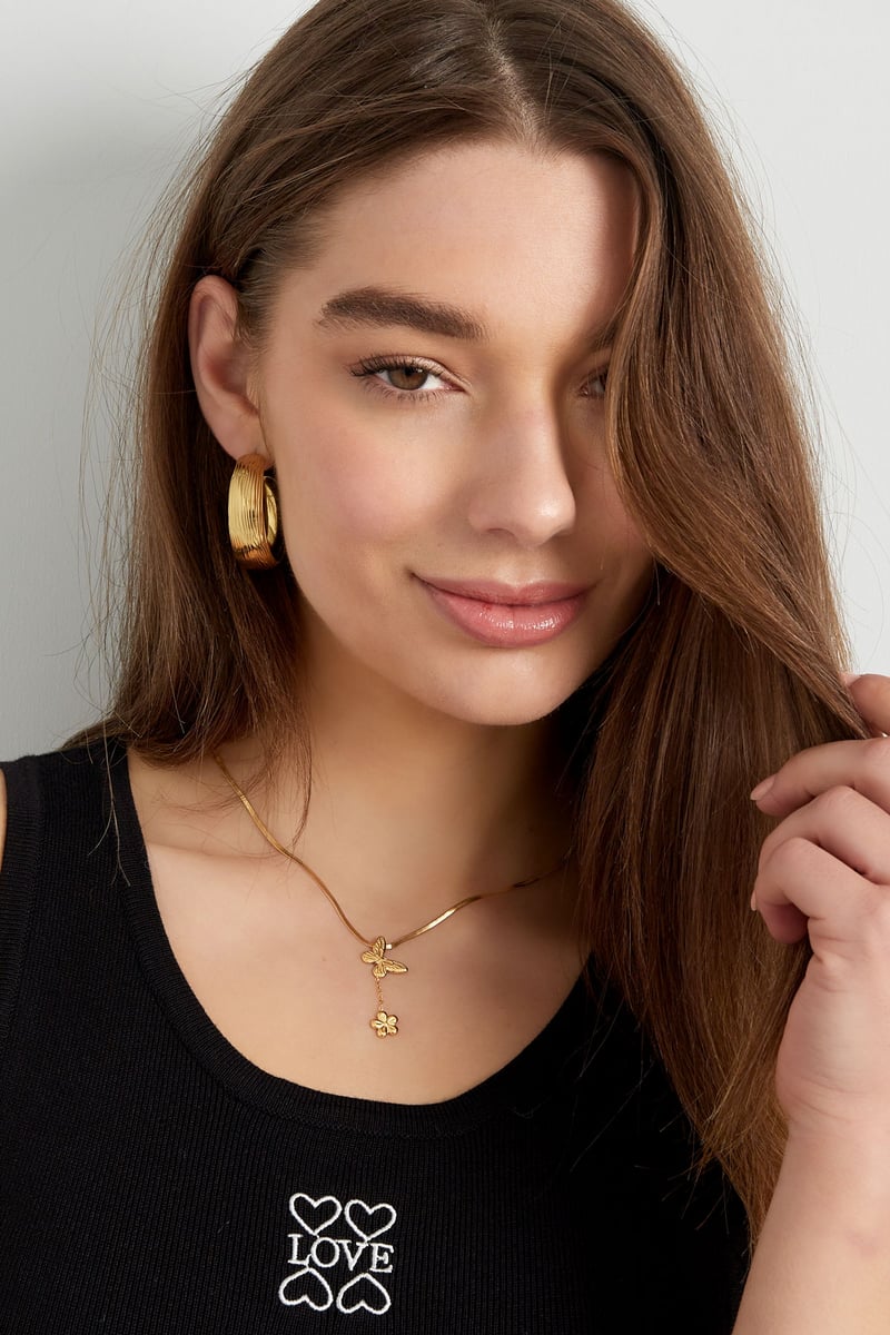 klassieke ketting met vlinder en bloem bedel