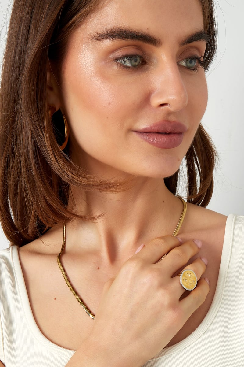 Ring rond met sterretjes - Goud kleur/zilver