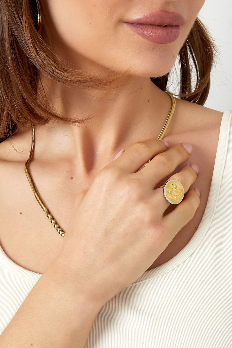 Ring rond met sterretjes - Goud kleur/zilver