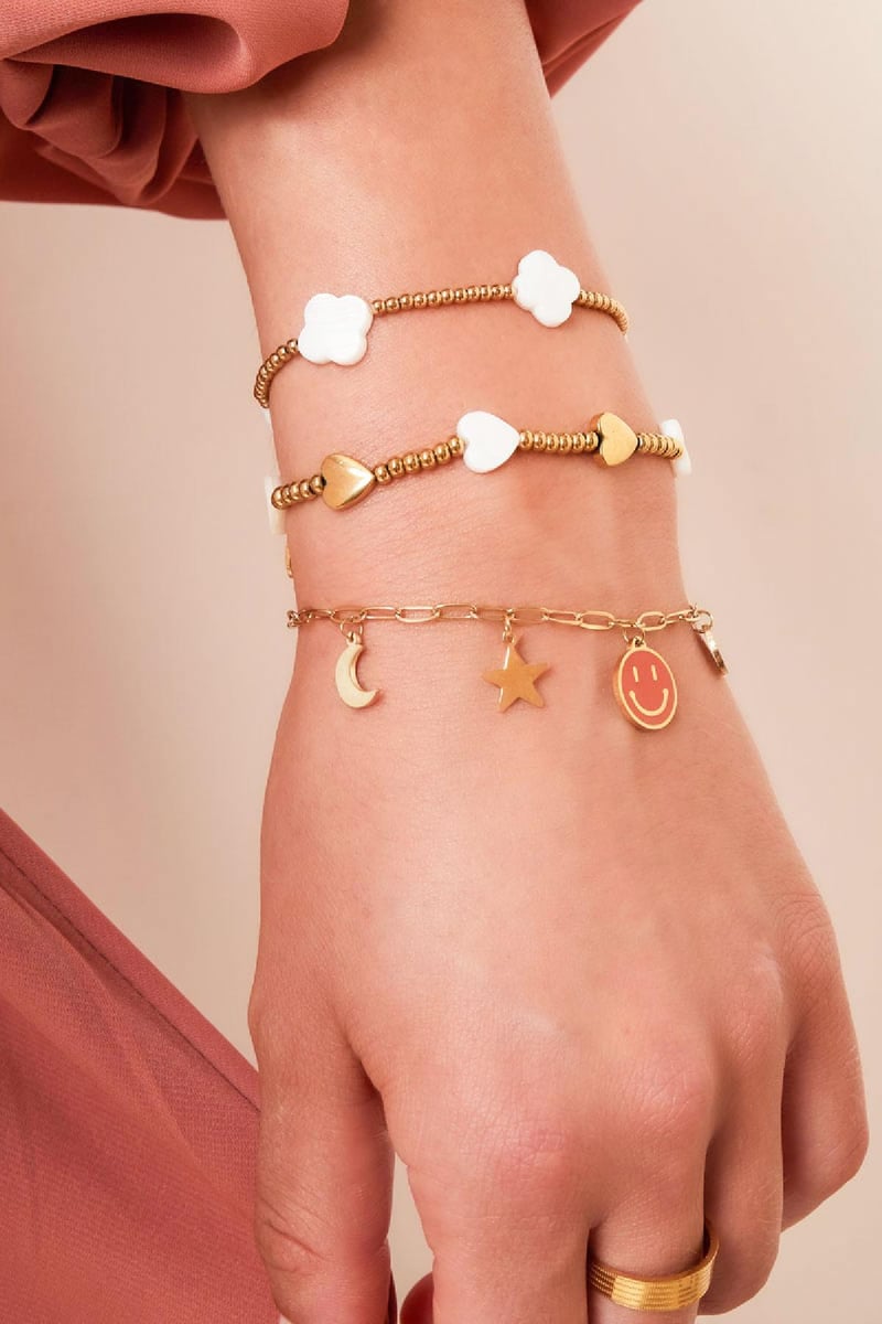 Armband zeeschelp klavertjes Goud kleur Stainless Steel