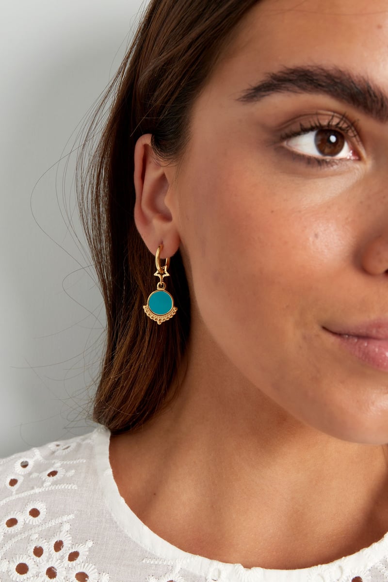 oorbel met ster en bedel blauw