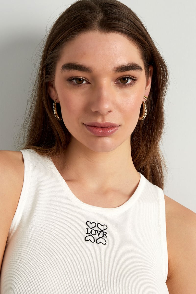 druppel vormige oorbel met steentjes met bolletjes