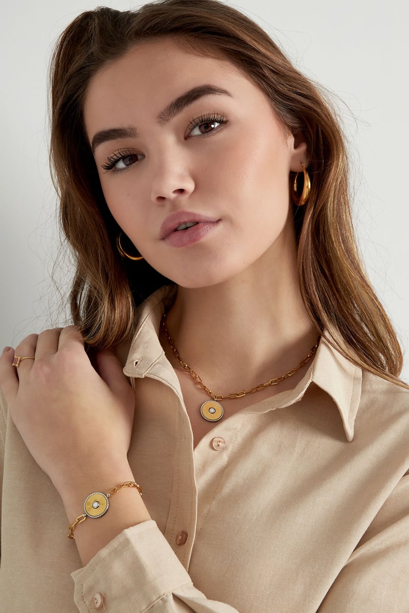 schakel armband met goud/ zilver detail