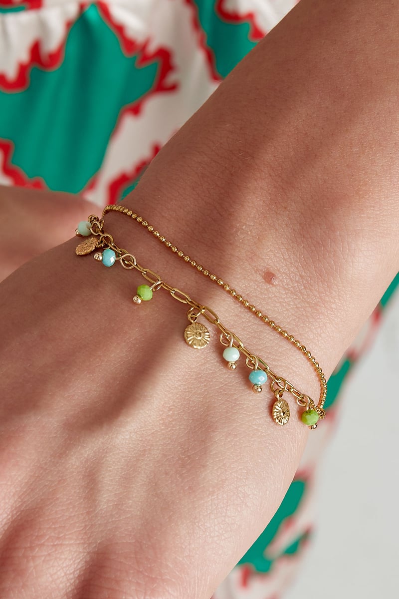 Armband met muntjes en kralen - roze/Goud kleur 