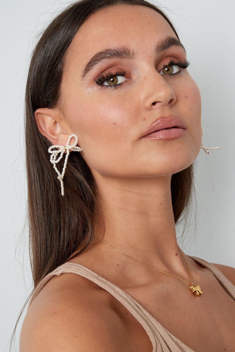 Parel met dubbele strik oorbellen