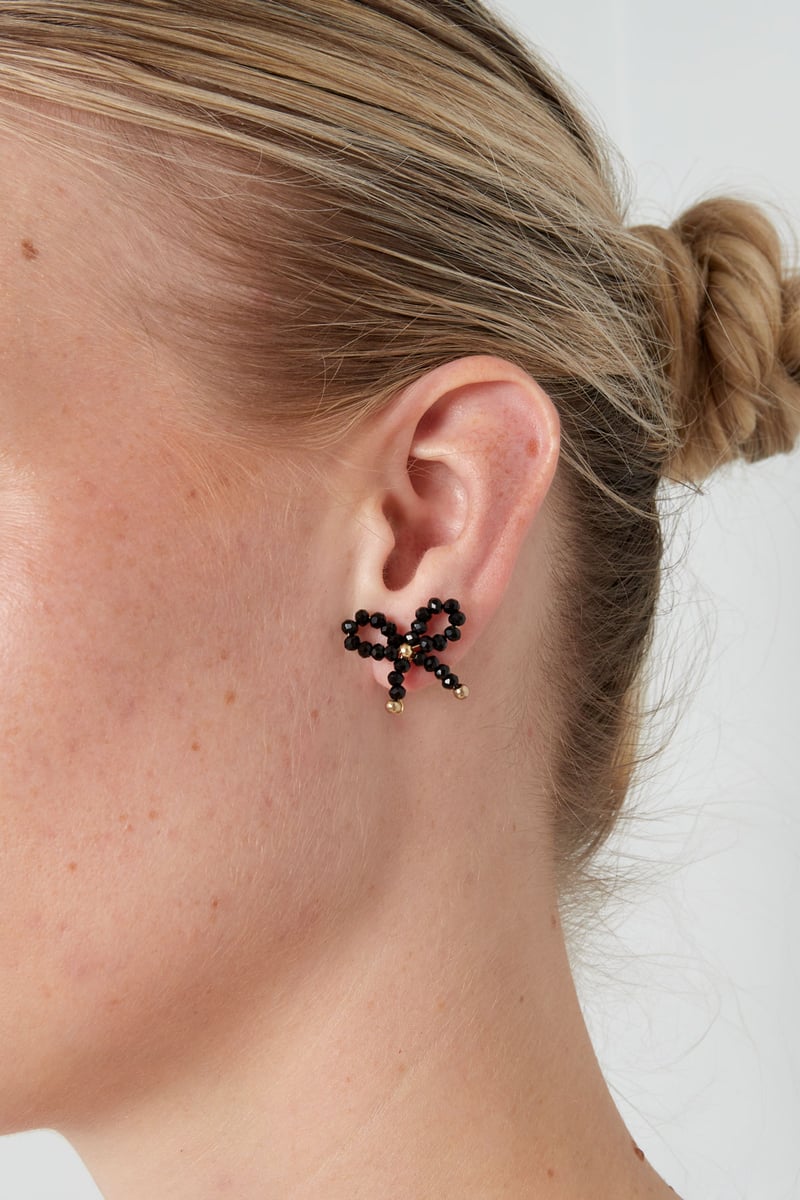 Oorbellen bow essential - lichtroze