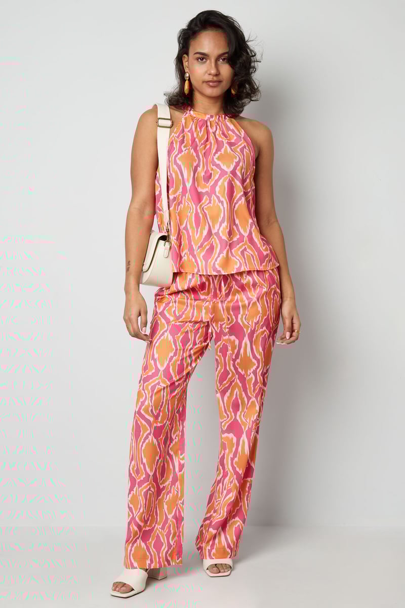 Kleurrijke haltertop met print - oranje/roze 
