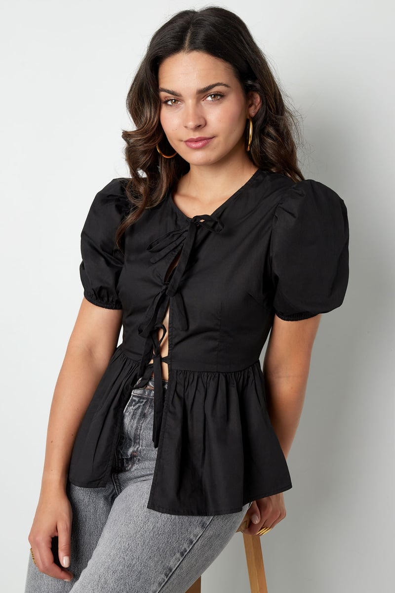 Musthave peplum blouse met strikjes - zwart