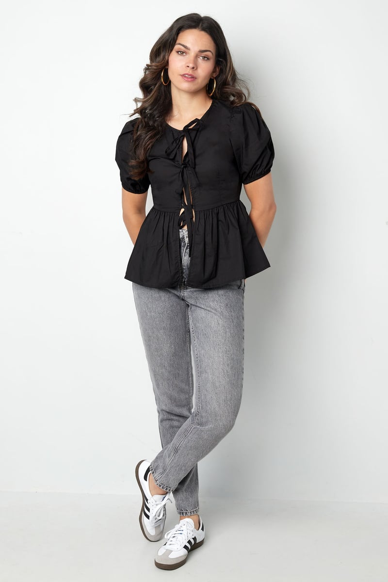 Musthave peplum blouse met strikjes - zwart