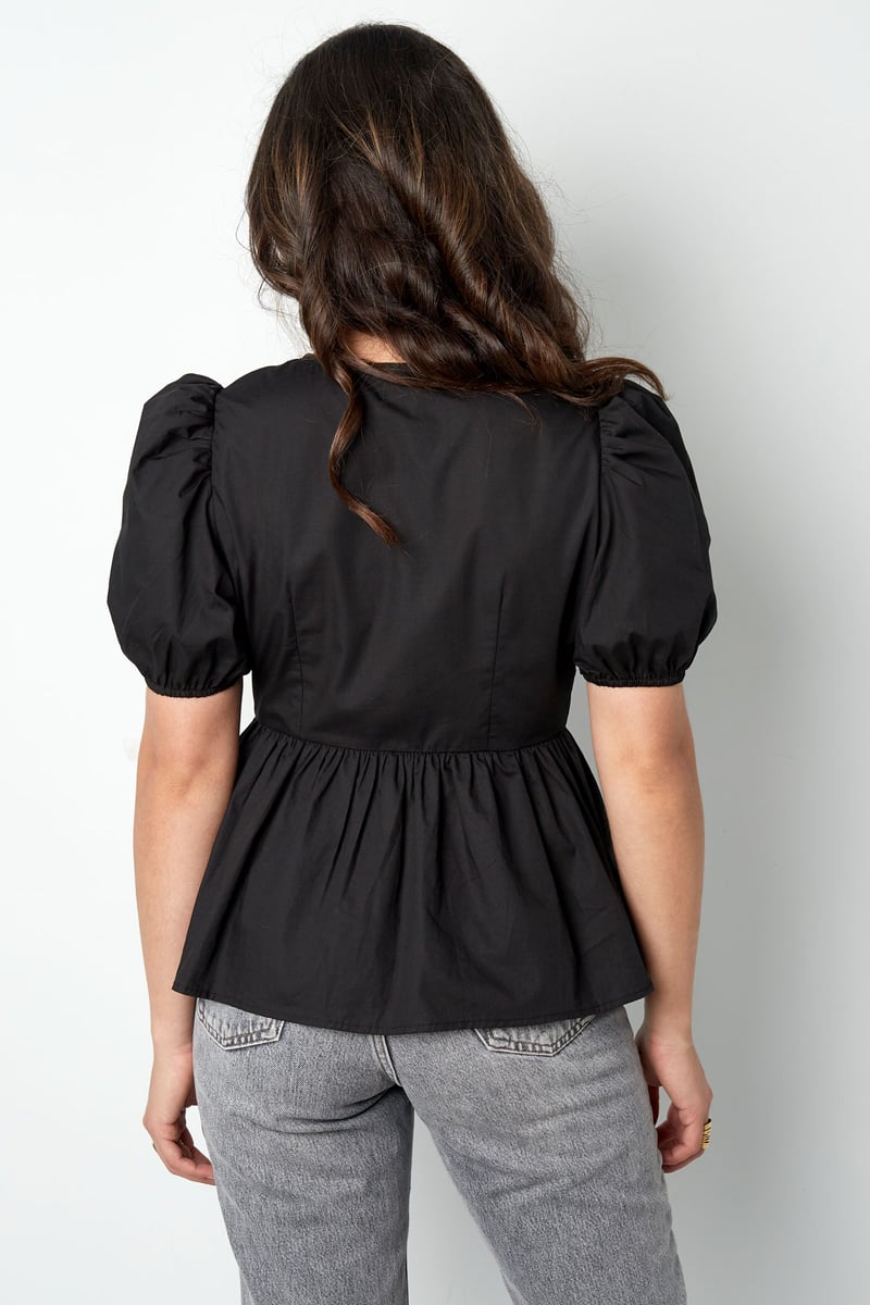 Musthave peplum blouse met strikjes - zwart
