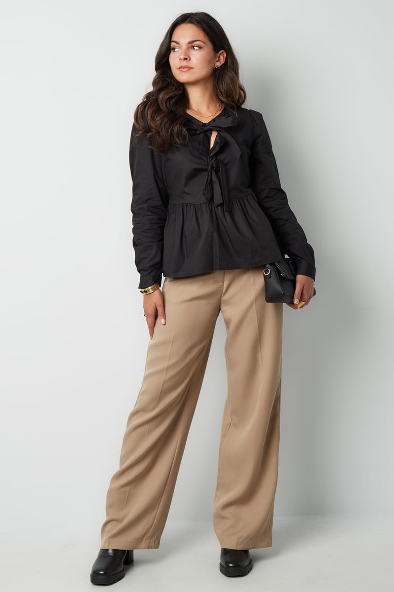 Longsleeve peplum top met strikjes - beige