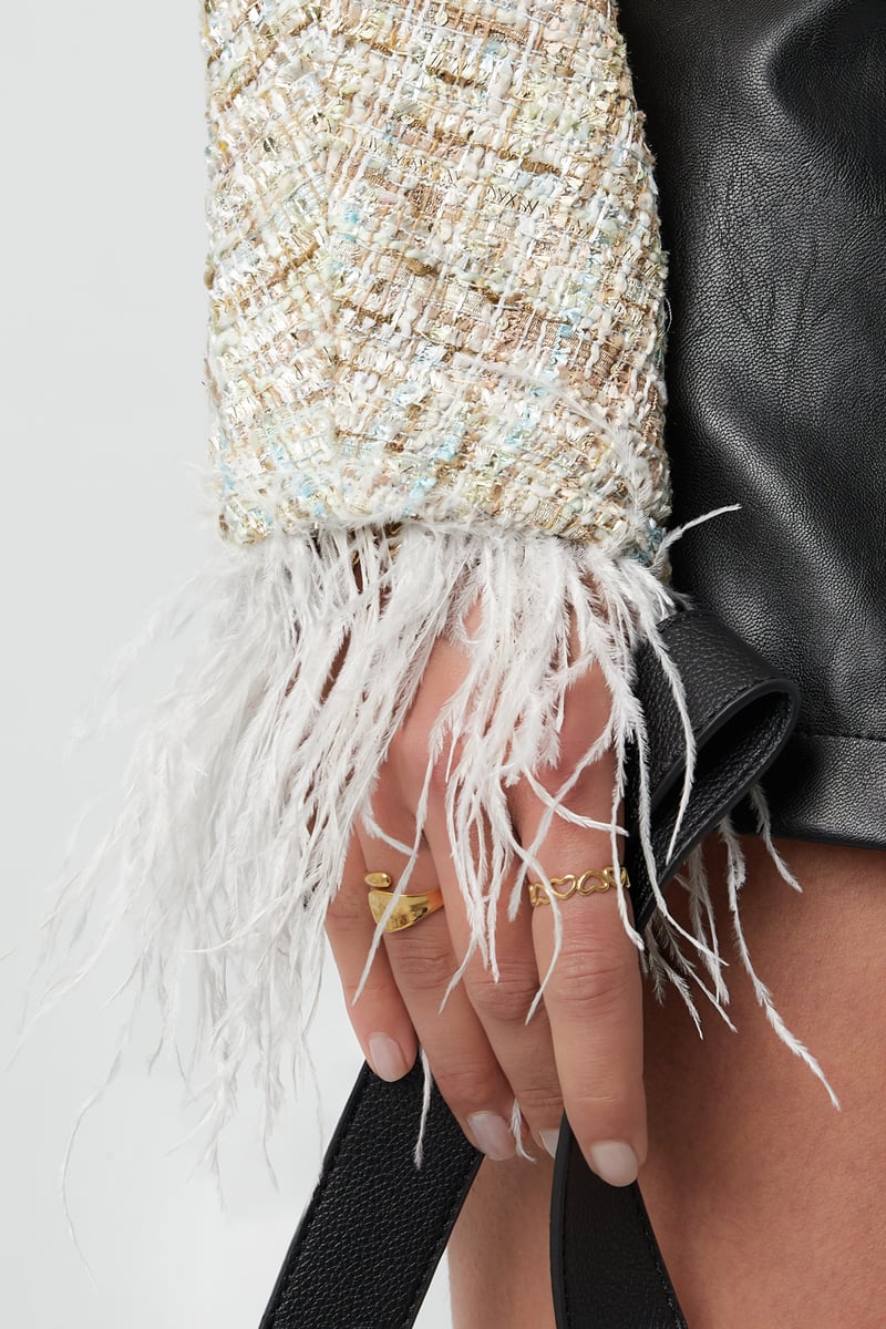 Zacht veren jasje met strikjes - groen