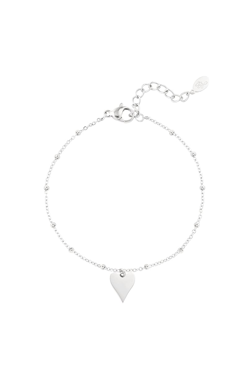 armband met bolletjes en hartbedel