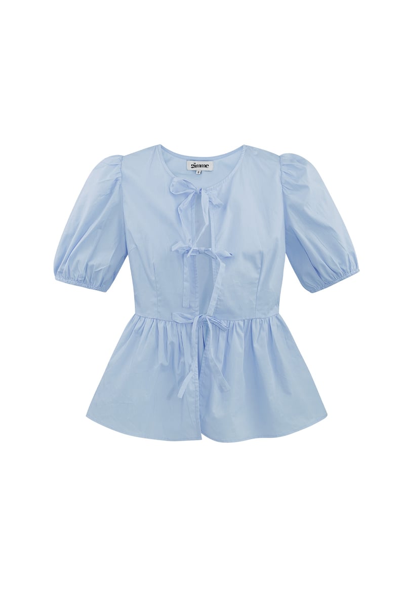 Musthave peplum blouse met strikjes - zwart