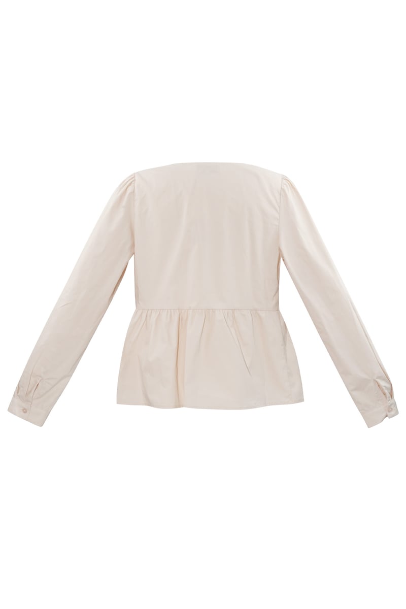 Longsleeve peplum top met strikjes - beige