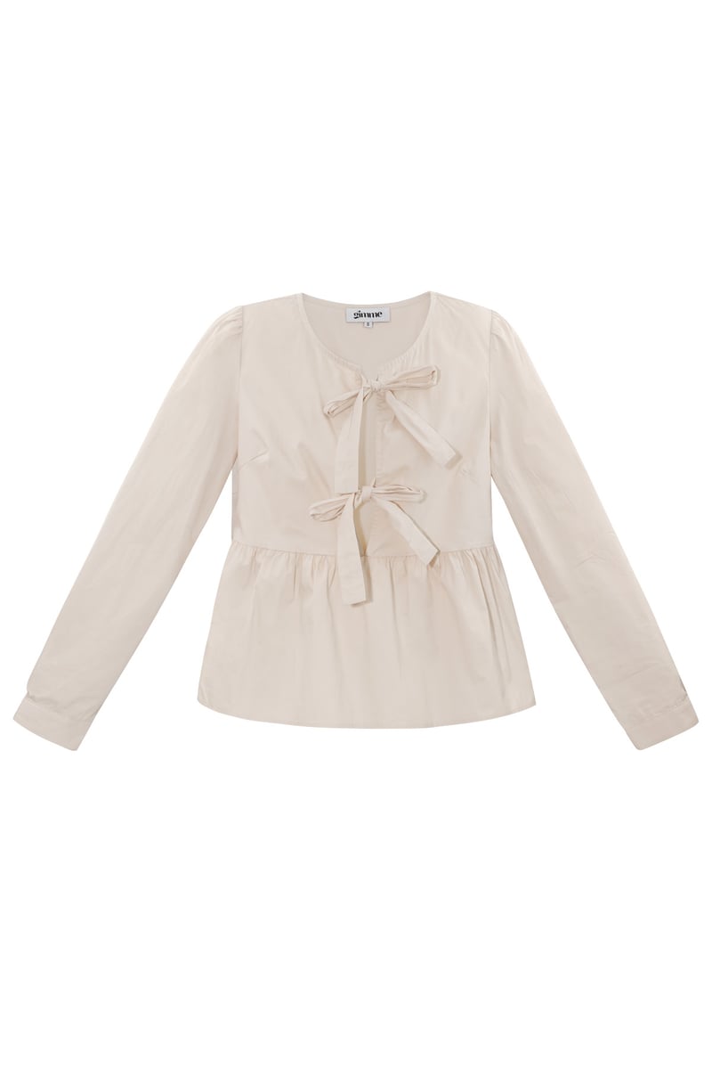 Longsleeve peplum top met strikjes - beige