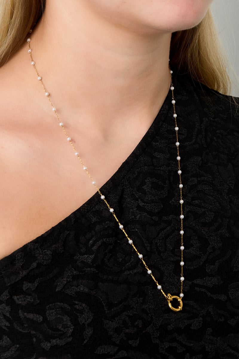 Slot met parelketting