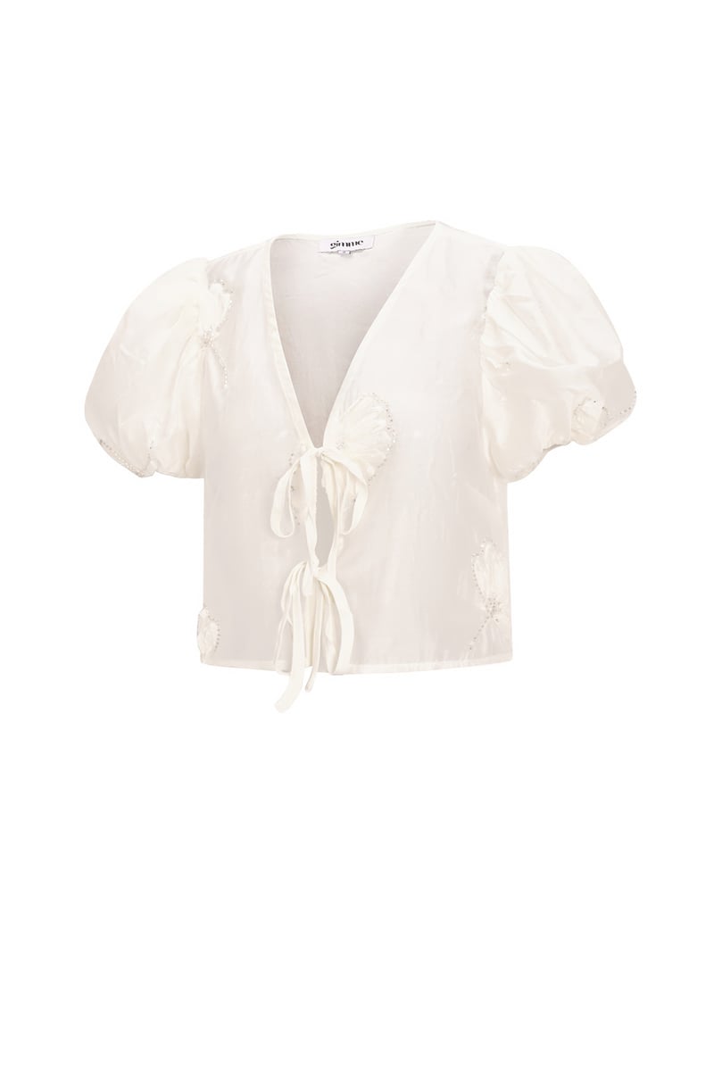 Top met bloementextuur