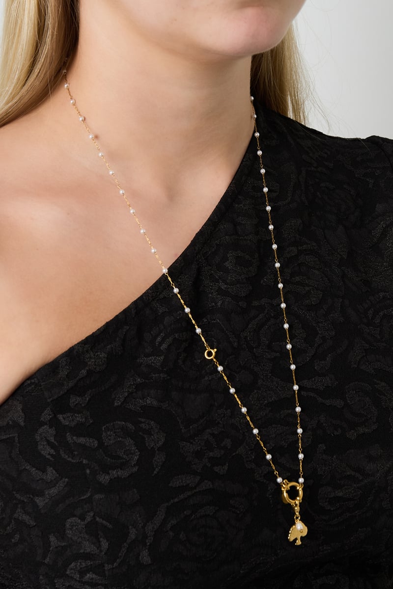 Slot met parelketting