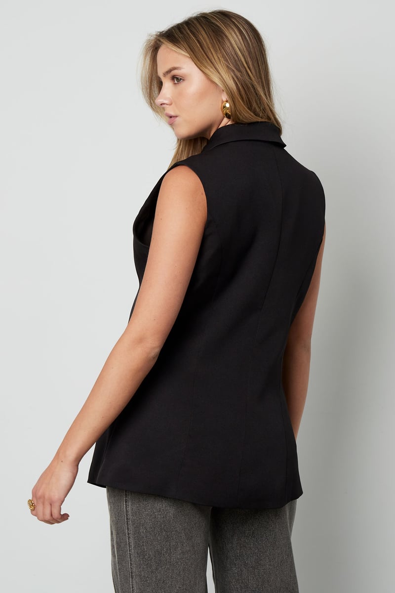 De mouwloze blazer